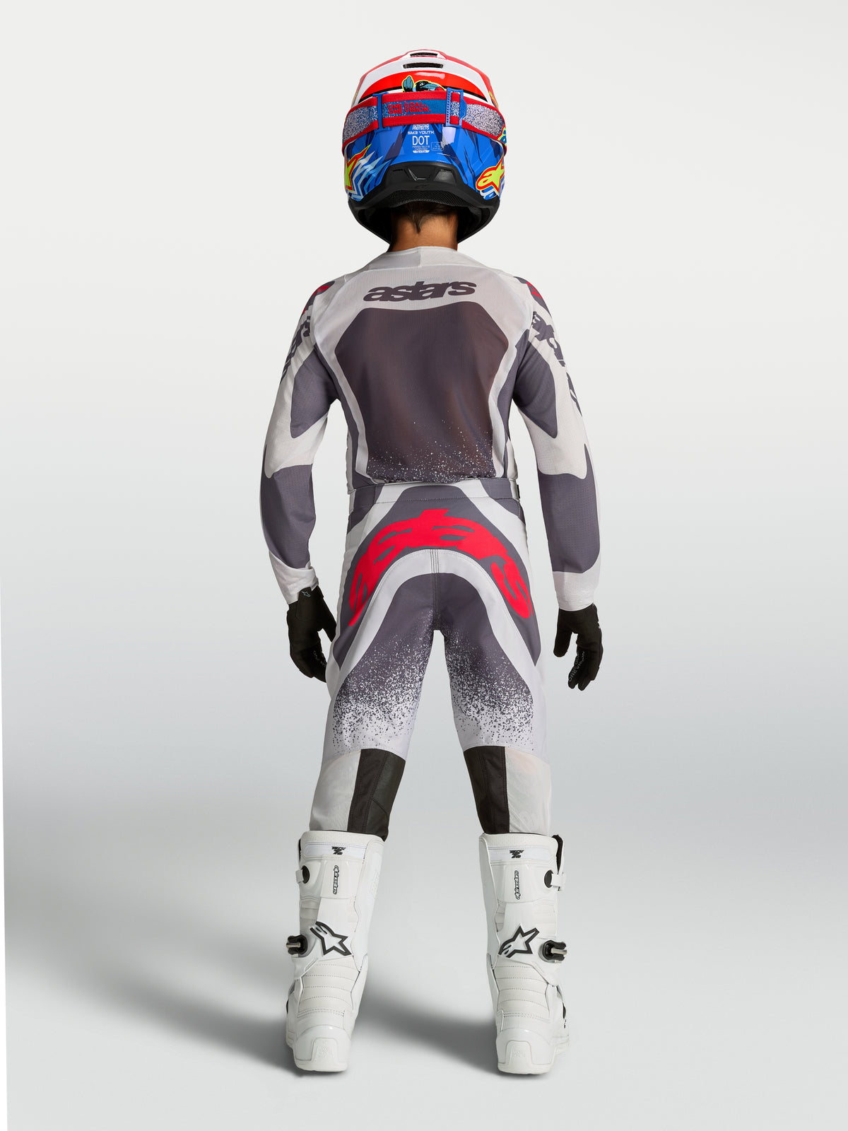 Alpinestars pantalones Supertech Swan juveniles, equipo de motocross, gris y rojo flúor, vista trasera
