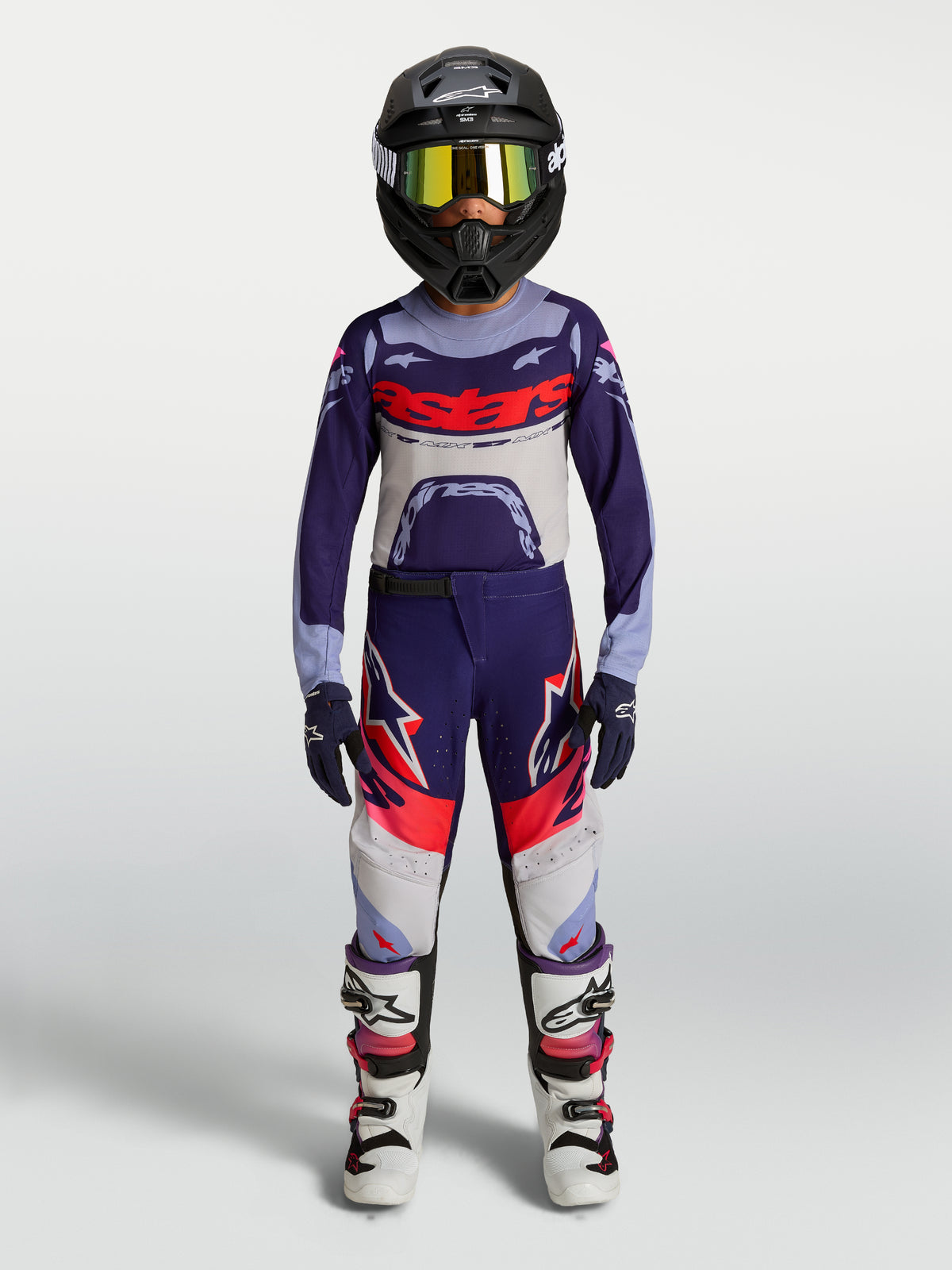 Alpinestars Youth Supertech Dyna Motocross Pants, purple and pink fluo gear set shown on-model for off-road racing.