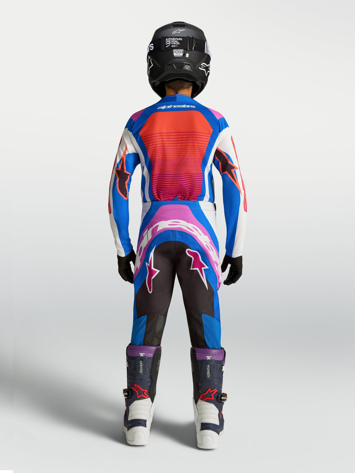Alpinestars Youth Supertech Maven Pants, Blue and Hot Coral Motocross Gear, Athletic Race Fit, Rear View on Young Rider.