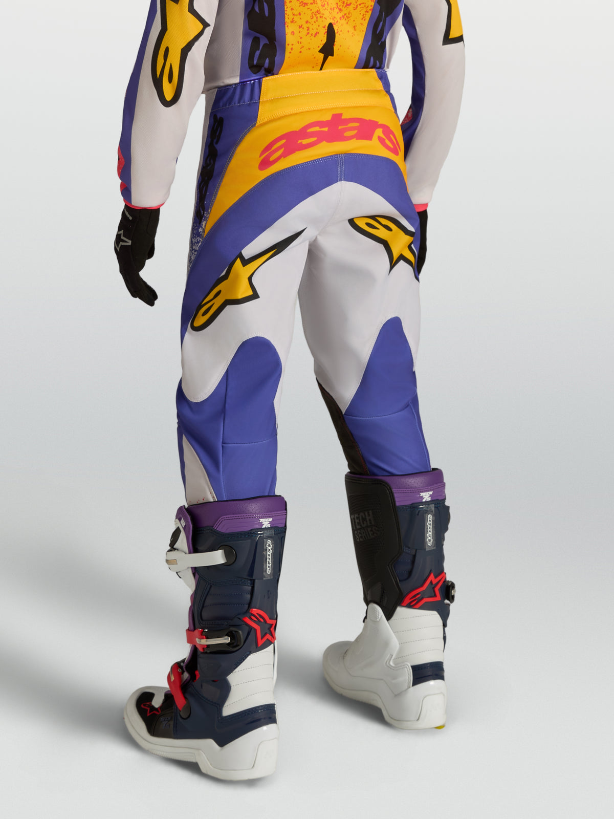 Alpinestars Youth Fluid Drag Pants, Blue and White Motocross gear for young riders with 600D polyfabric construction.