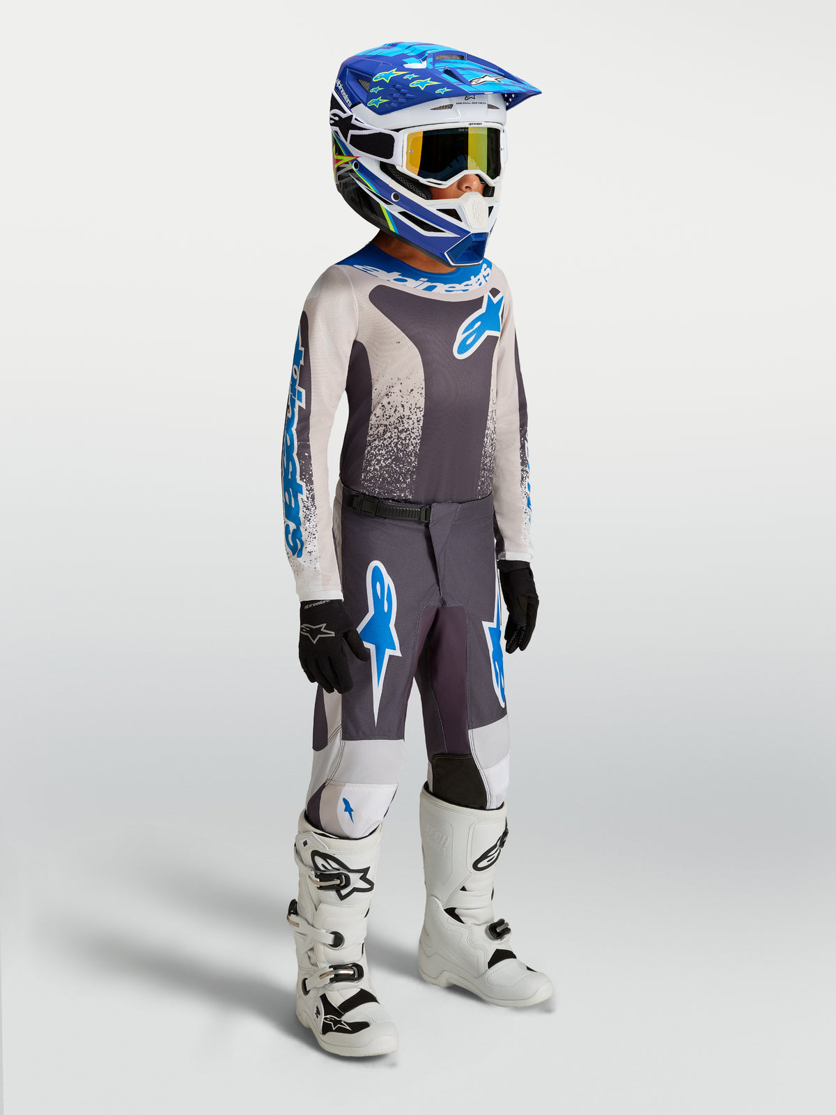 Alpinestars Youth Fluid Drag Pants, youth motocross racing pants in graystone and blue with durable 600D polyfabric.