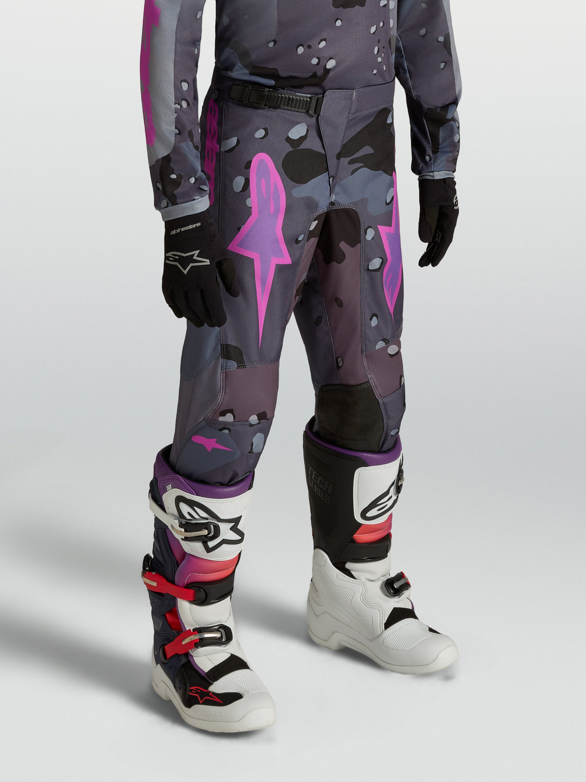 Alpinestars Youth Fluid Lone Pants, youth motocross pants in gray camo and purple, with durable 600D textile construction.