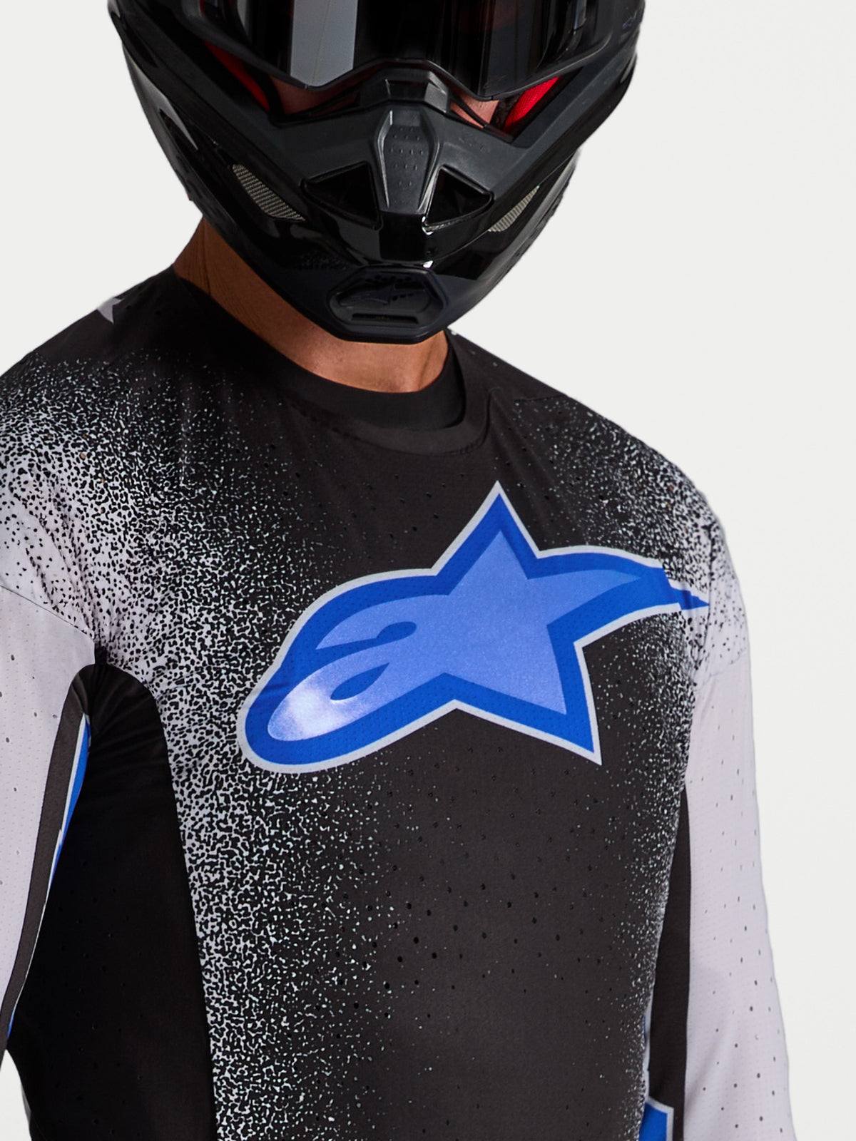 Alpinestars Supertech Hiten AFD, jersey de motocross para hombre, negro y azul, ventilaciones láser y gran logotipo frontal