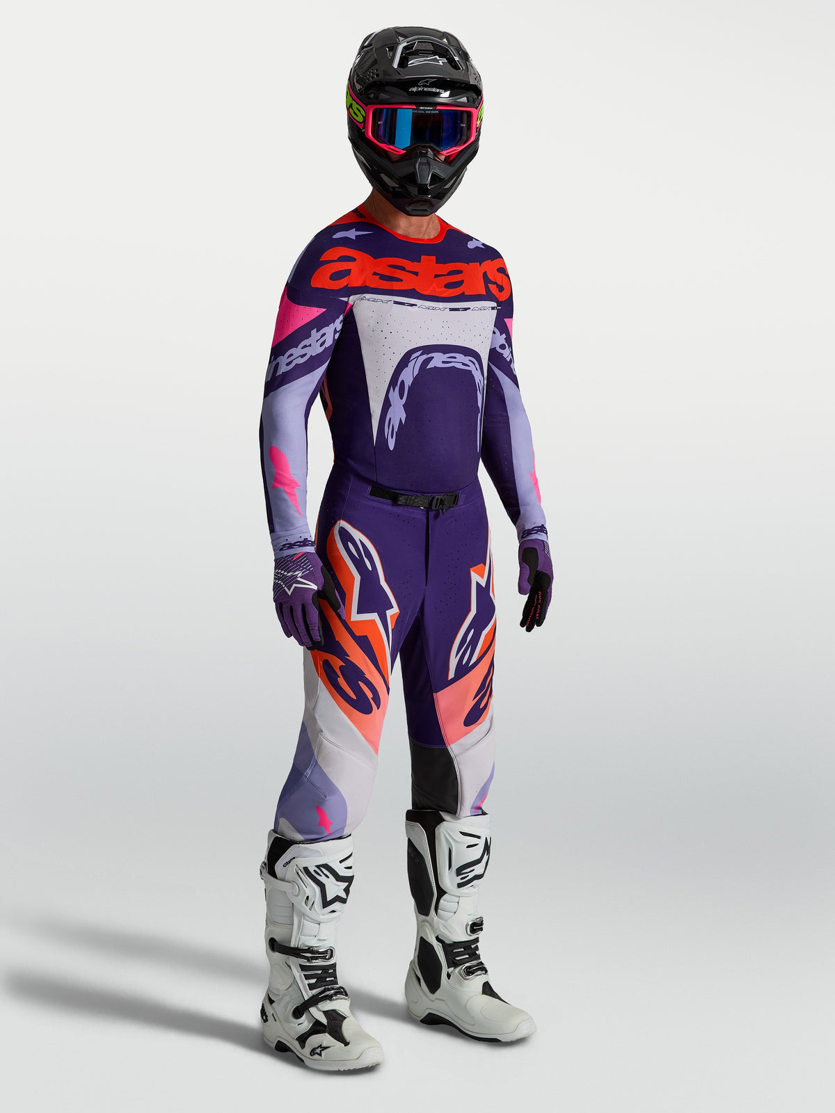 Alpinestars Supertech Dyna Gear Set, purple and pink fluo men's motocross racing outfit with athletic fit mesh.