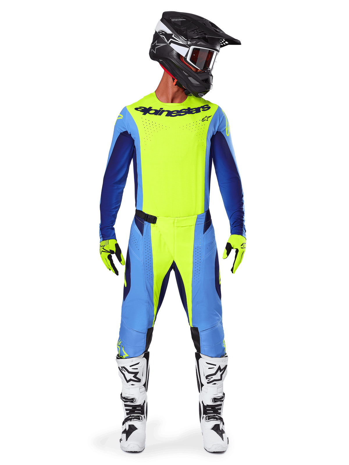 Piloto de motocross con equipamiento de competición completo, Jersey Alpinestars 2025 Techstar Melt en amarillo flúor y azul, pantalones de motocross a juego en amarillo y azul, casco negro con gráficos blancos y gafas, botas blancas y negras, guantes amarillos y negros, conjunto de alto rendimiento coordinado para carreras todoterreno
