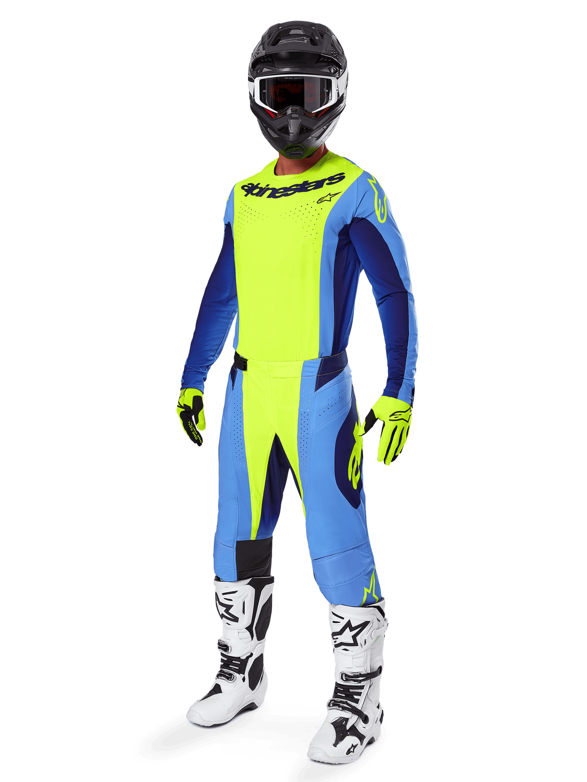 Piloto de motocross con el jersey Alpinestars Techstar Melt 2025, amarillo flúor y azul, combinado con pantalones a juego, casco negro con gafas, guantes amarillos y botas blancas y negras, equipamiento de rendimiento coordinado completo para carreras off-road