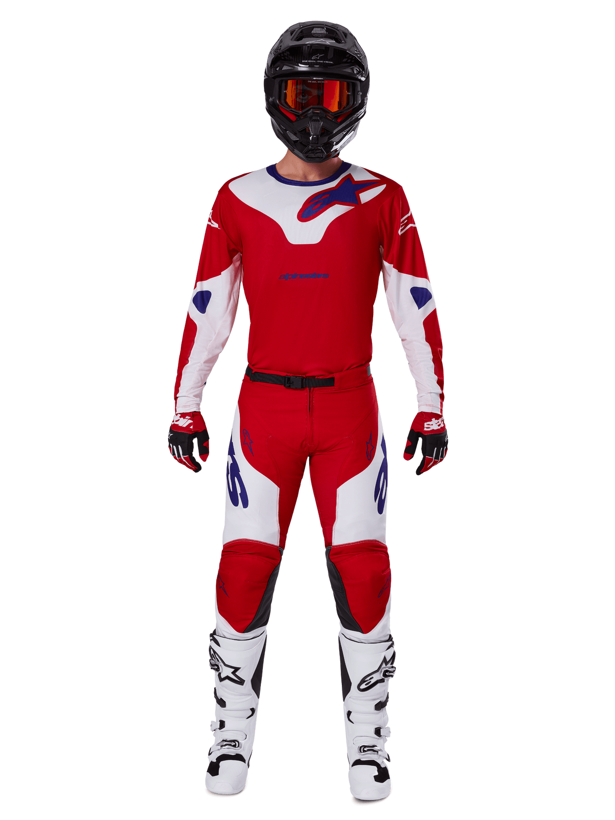 Motocross rider wearing the Alpinestars 2025 Racer Veil Gear Set, Bright Red and White jersey and pants with blue accents, black helmet with red goggles, white boots, and red and black gloves, coordinated outfit for off-road racing