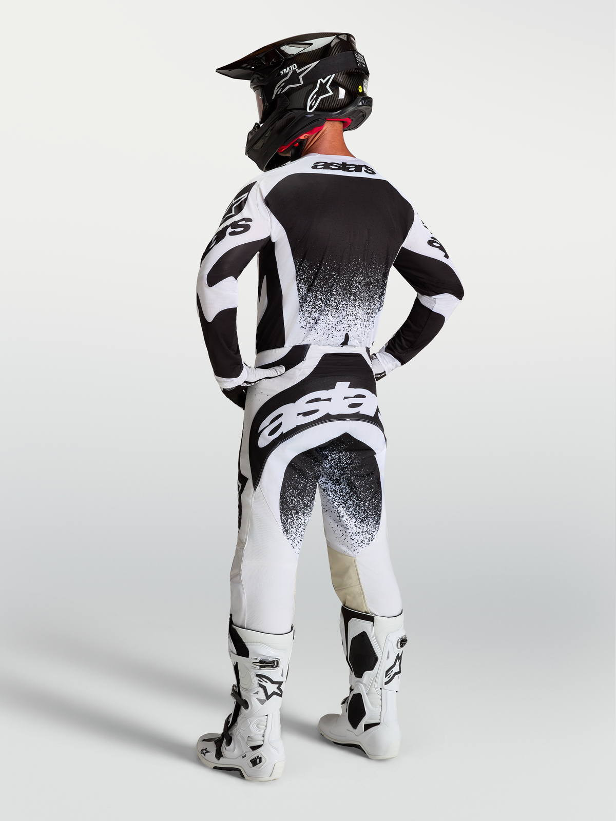 Alpinestars Techstar Swan, jersey y conjunto de motocross, hombre, blanco y negro con gráficos de salpicadura, vista trasera
