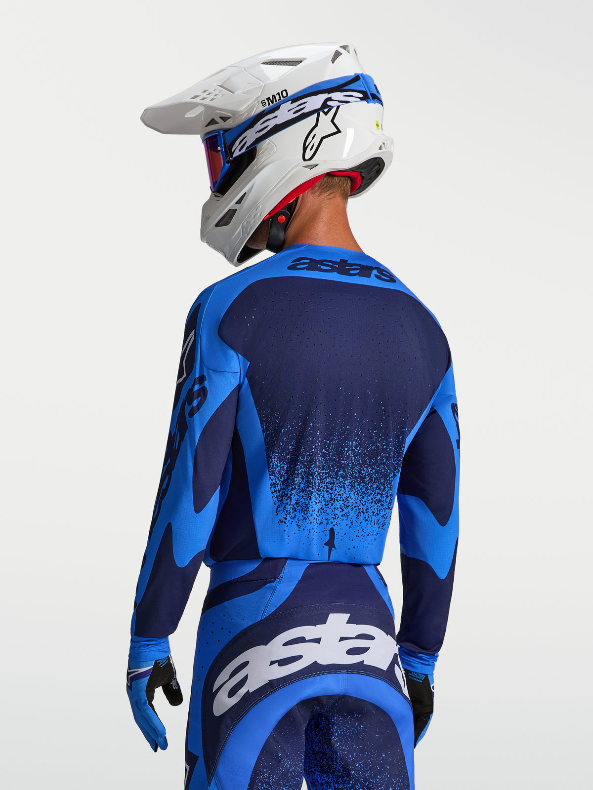 Alpinestars Techstar Swan, jersey de motocross para hombre, azul y azul oscuro con perforaciones láser, vista trasera