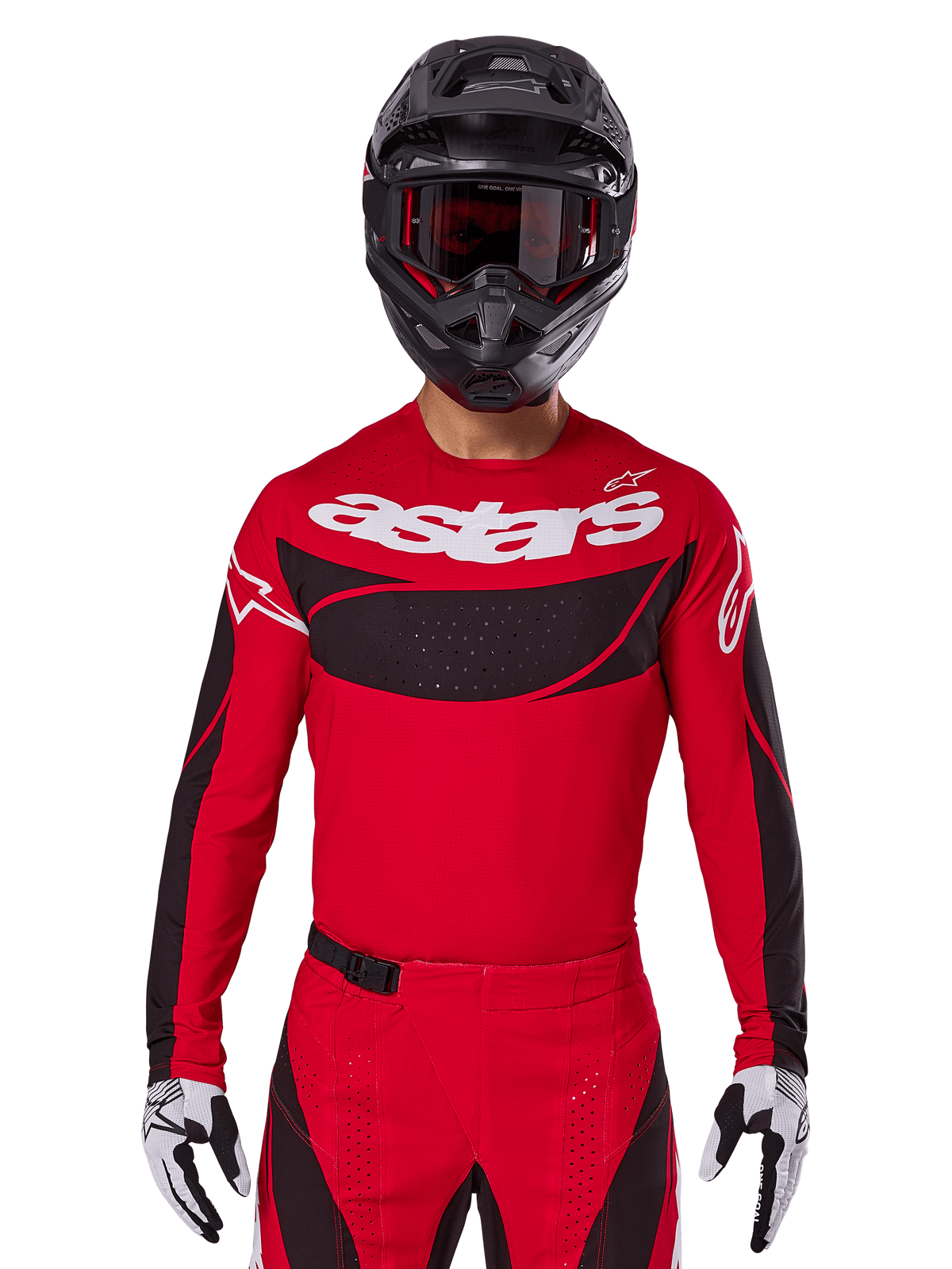 Alpinestars Techstar Dreem Jersey 2025, jersey de motocross rojo y negro, con logo 'astars' blanco y panel de ventilación negro en el pecho, usado con pantalones a juego, casco negro y guantes blancos y negros, diseñado para competición profesional off-road
