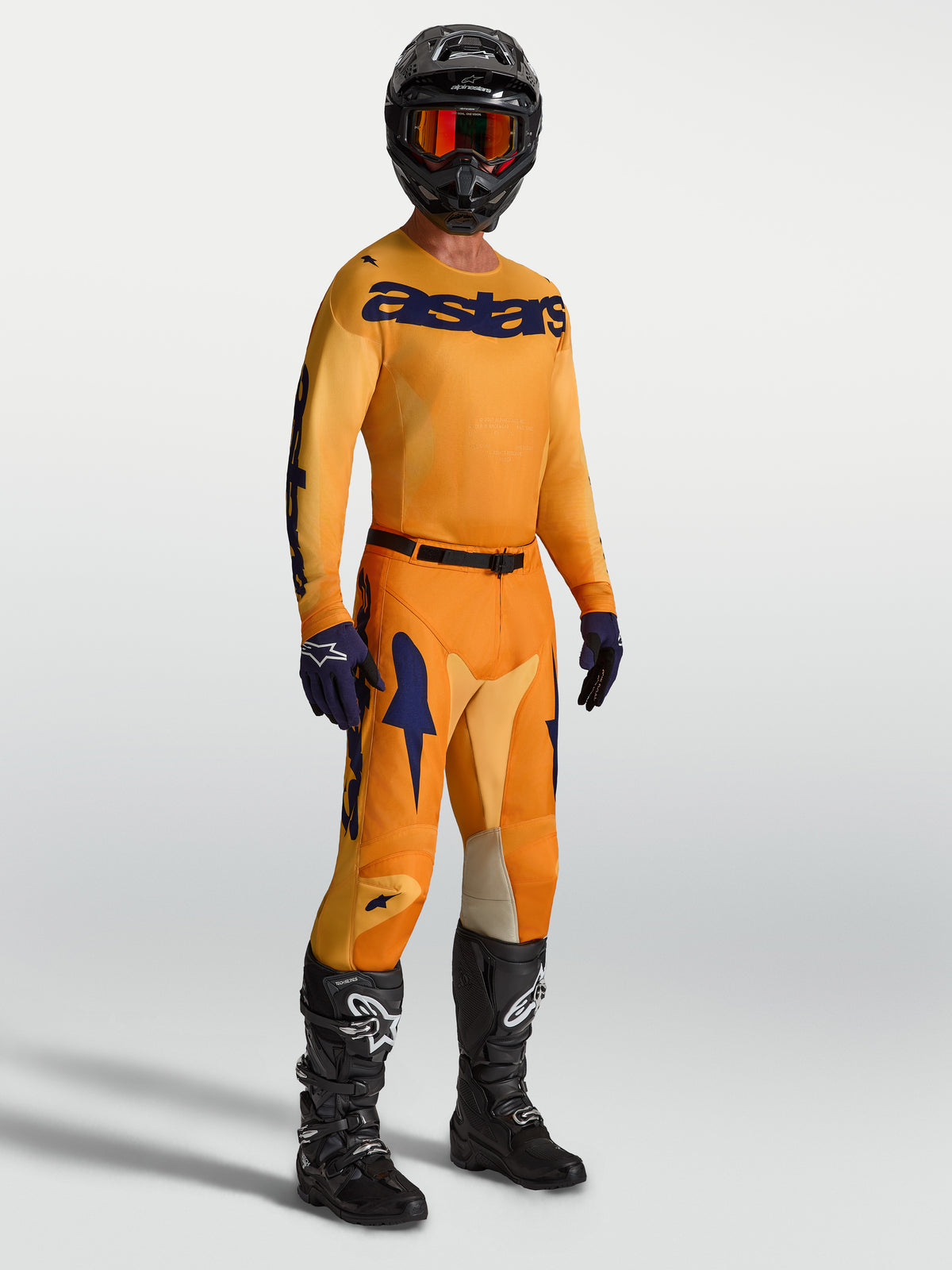 Alpinestars Racer Amber 2027, conjunto de motocross para hombre, naranja y azul profundo, jersey y pantalones para off-road.