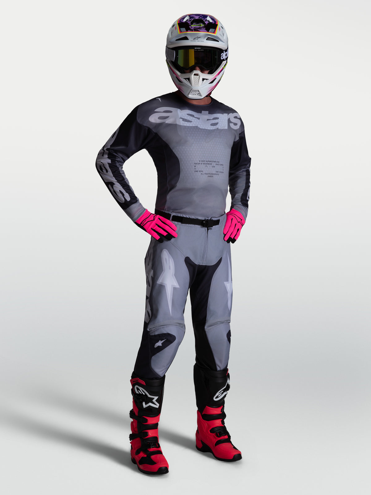 Alpinestars Racer Amber 2027 jersey y equipación de motocross para hombre, gris y rosa, con ajuste deportivo.