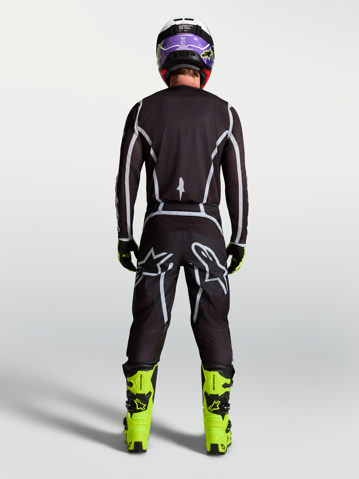 Jersey Alpinestars Fluid Apex V2, equipo de motocross de hombre, negro y plateado, vista trasera con kit de carreras completo