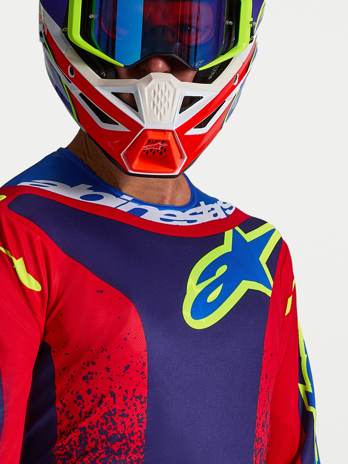 Alpinestars Jersey Fluid Drag, jersey de motocross, azul marino y rojo fuego, con logotipo en el pecho y cuello deportivo