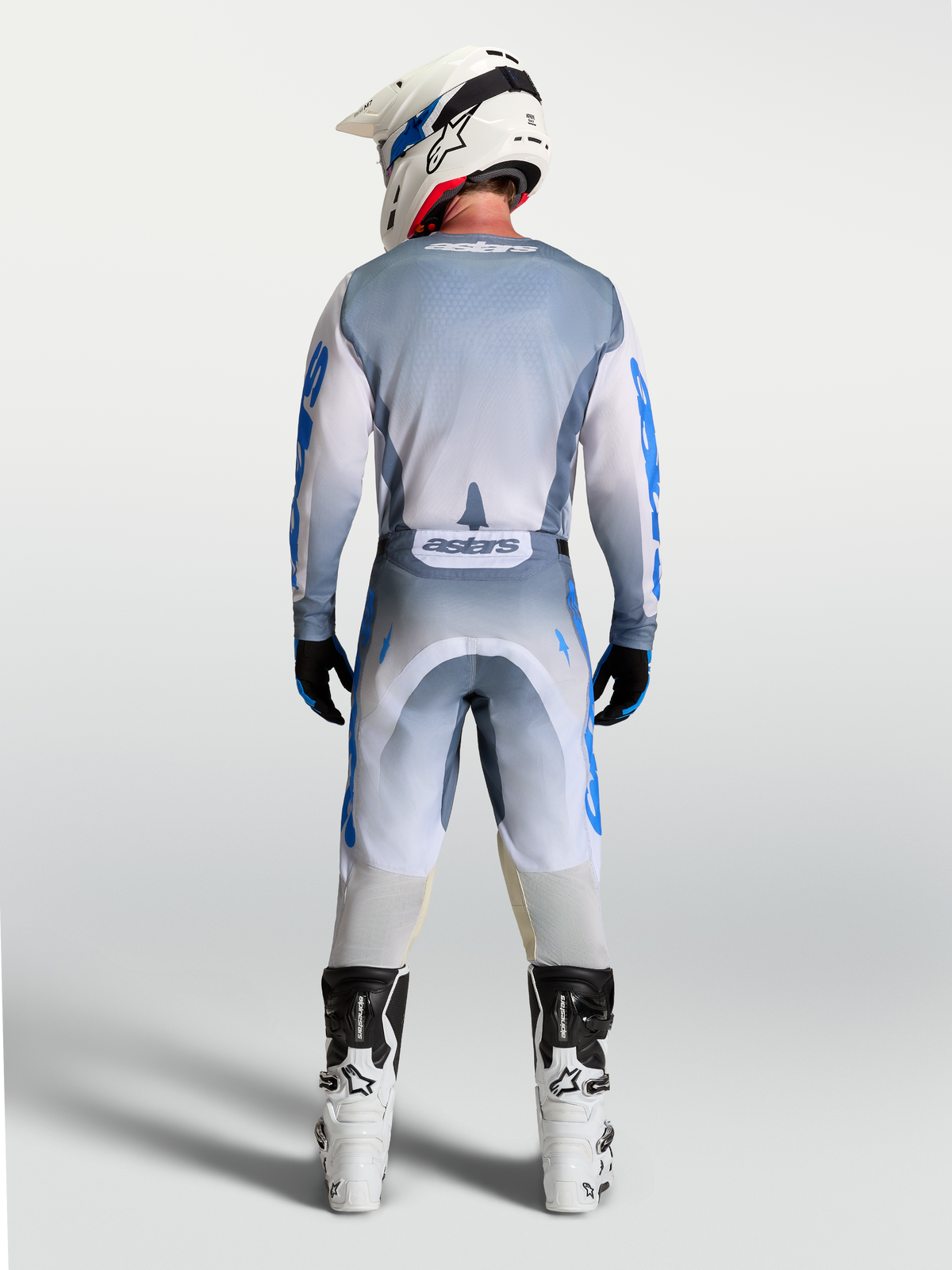 Jersey Alpinestars Racer Amber, equipo de motocross para hombre, gris y azul, vista trasera completa en modelo