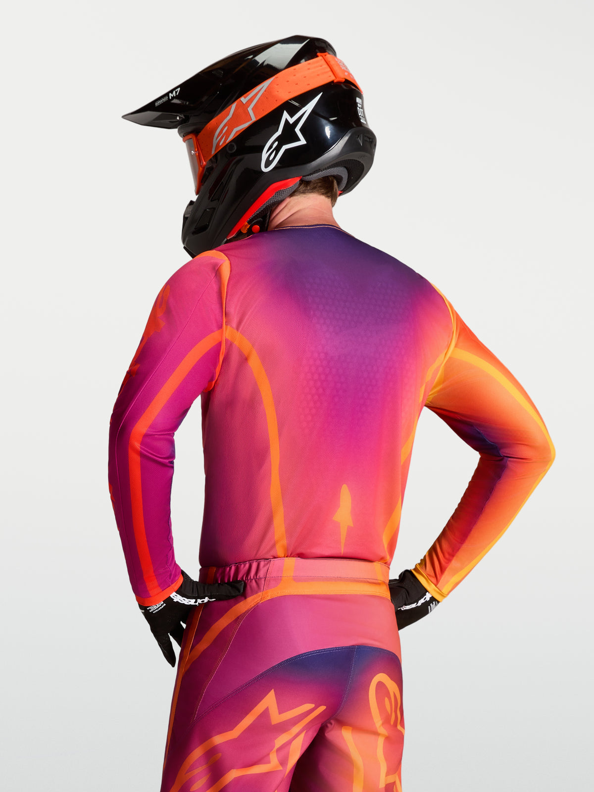 Alpinestars Fluid Kepler, jersey de motocross para hombre, morado y naranja, vista trasera con ajuste ergonómico