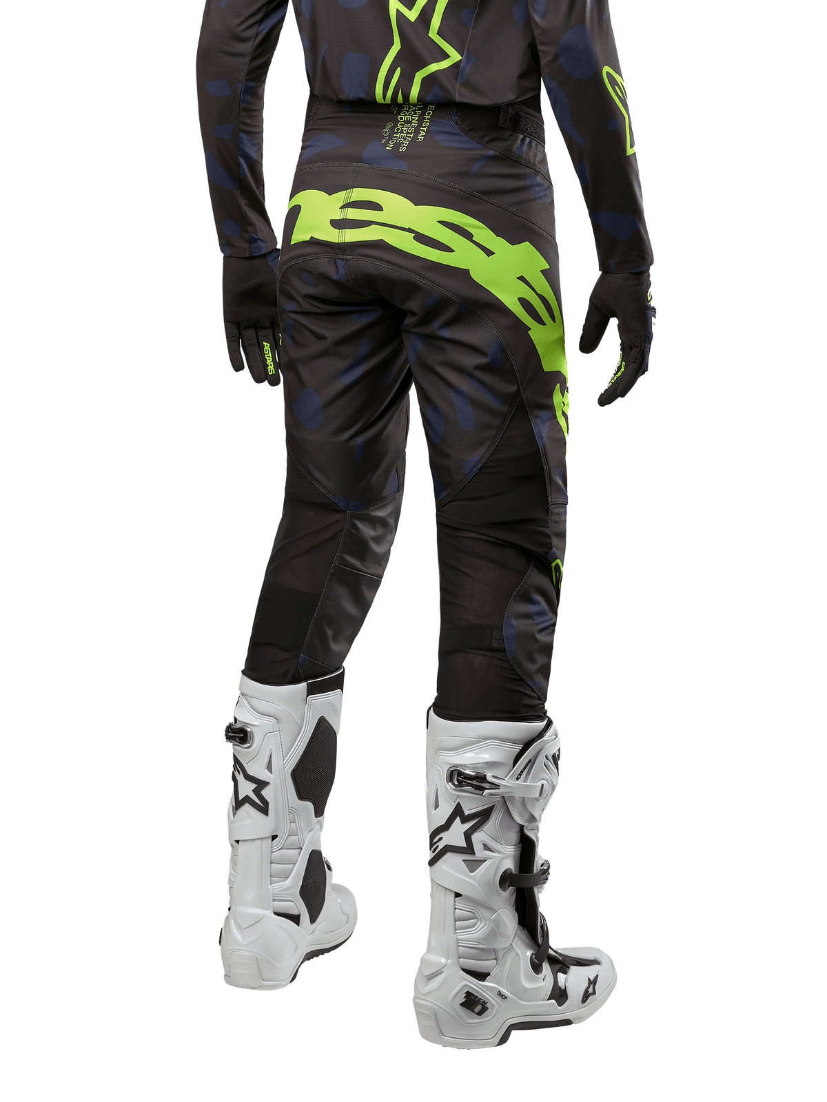 Alpinestars 2024 Techstar Rantera Pants, Motocross Pants, Black Navy and Yellow Fluo, back view, featuring bold neon yellow branding and mesh ventilation panels, worn with matching jersey and white boots, durable gear for motocross and off-road racing