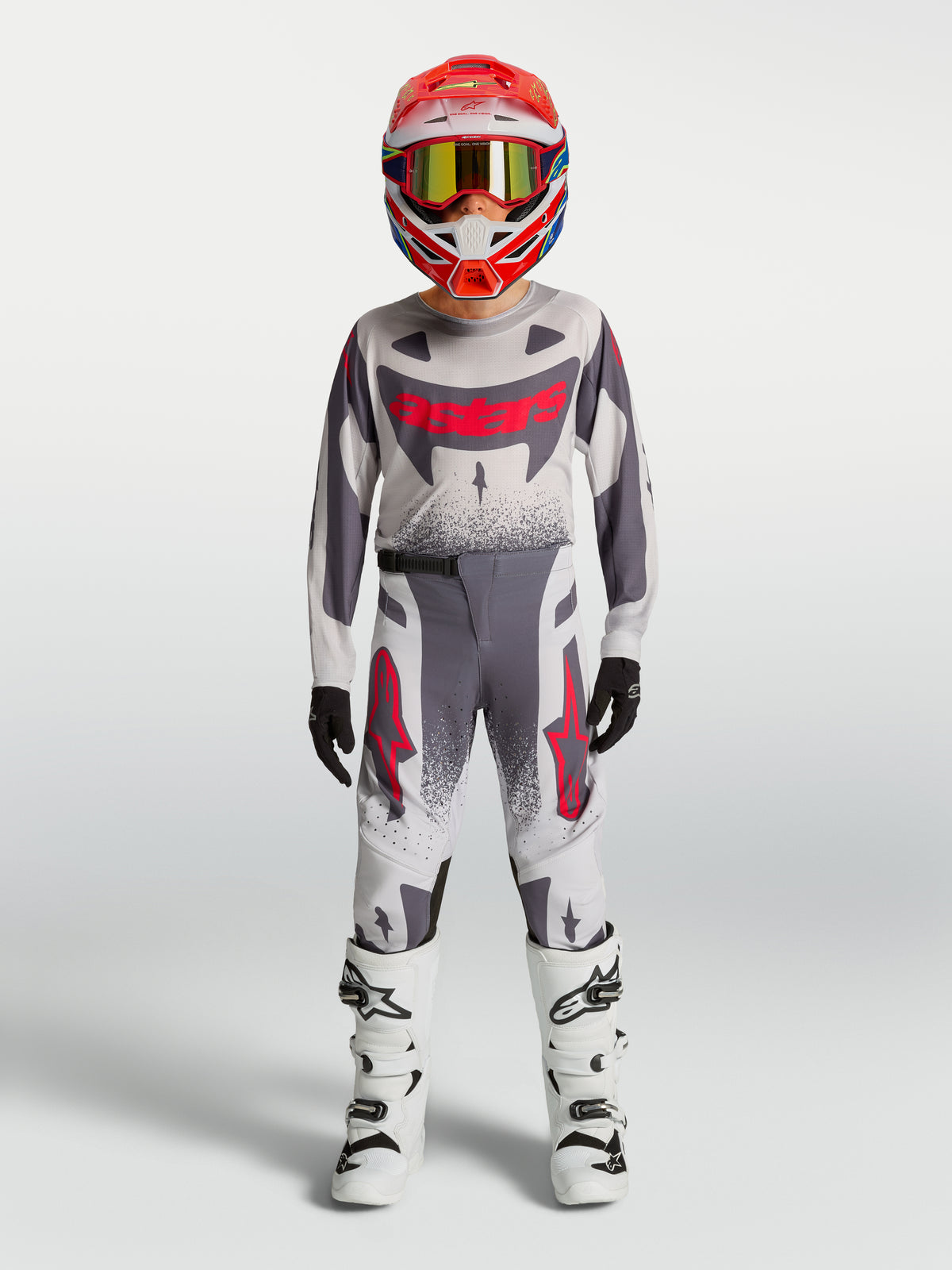 Alpinestars 2027 Youth Supertech Swan Jersey and Gear Set, gray and white motocross racing outfit with red accents.