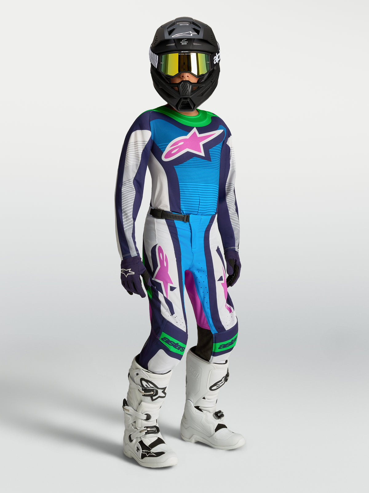 Alpinestars 2027 Youth Supertech Maven Gear Set, White and Blue Motocross Jersey and Pants with Green accents and Boots.