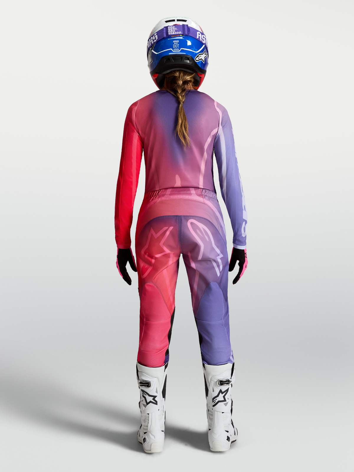 Jersey Stella Fluid Kepler de Alpinestars, jersey de motocross para mujer, morado y rojo, polifabricado, vista trasera.