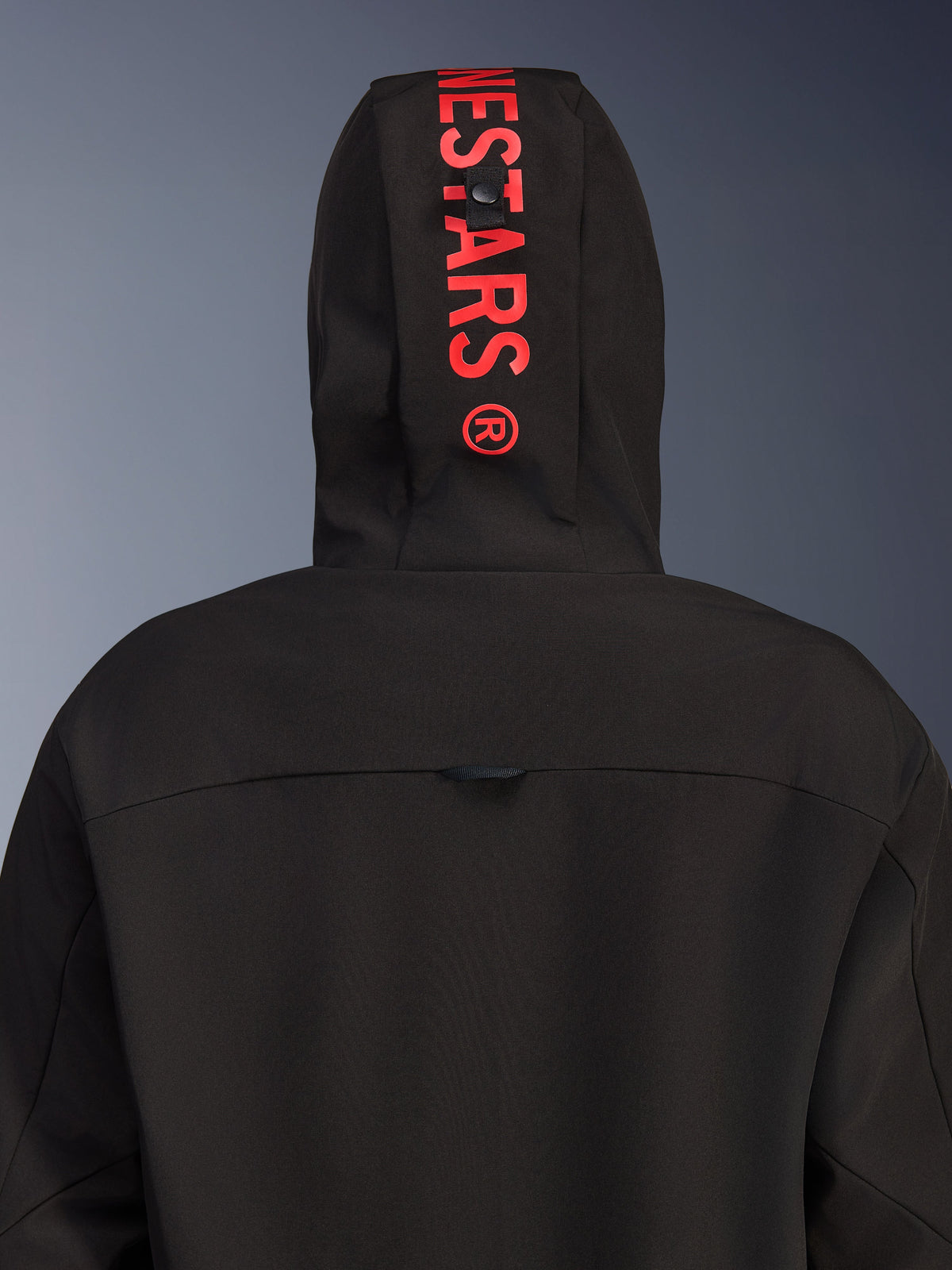 Alpinestars Radium Tech Hoodie, Urban Motorcycle Jacket, Black with Bright Red, rear view focusing on the hood with vertical red logo branding, windproof textile shell and contemporary design.