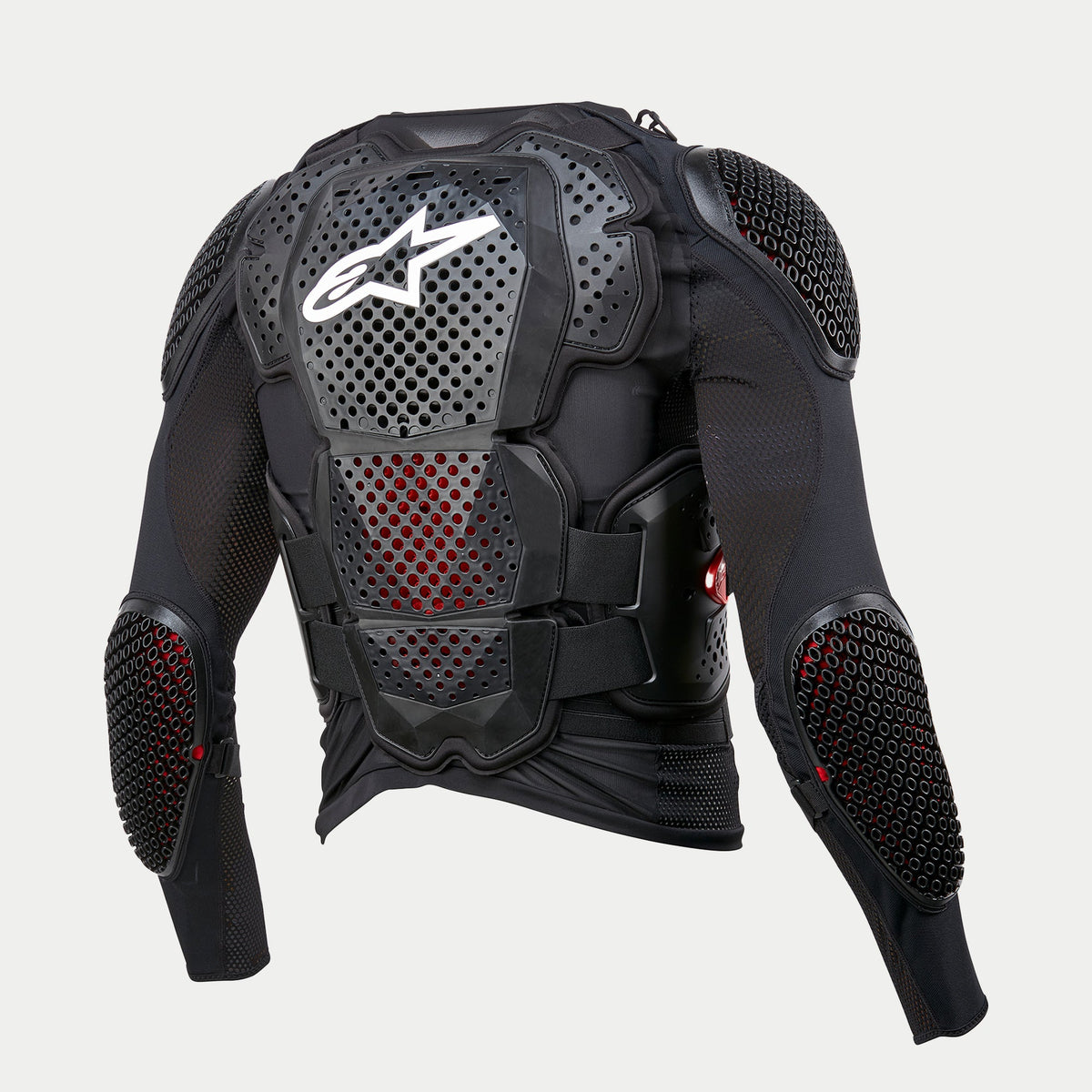 Chaqueta protectora Alpinestars Bionic Tech V3, negra, vista trasera con protecciones integradas en espalda, hombros y codos, logotipo blanco de Alpinestars en placa dorsal perforada, confección en malla elástica con acolchado interior rojo visible y correas en V ajustables para protección off-road.