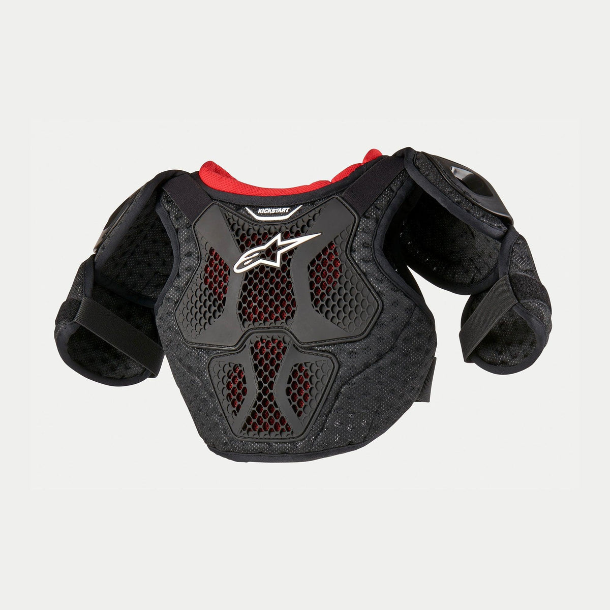 Alpinestars Youth Bionic Action Kickstart Chest Guard, protector de pecho de motocross para niños, negro y rojo, con placas de TPR semirrígidas, malla de nido de abeja ventilada, logo blanco y protectores de hombros y bíceps.