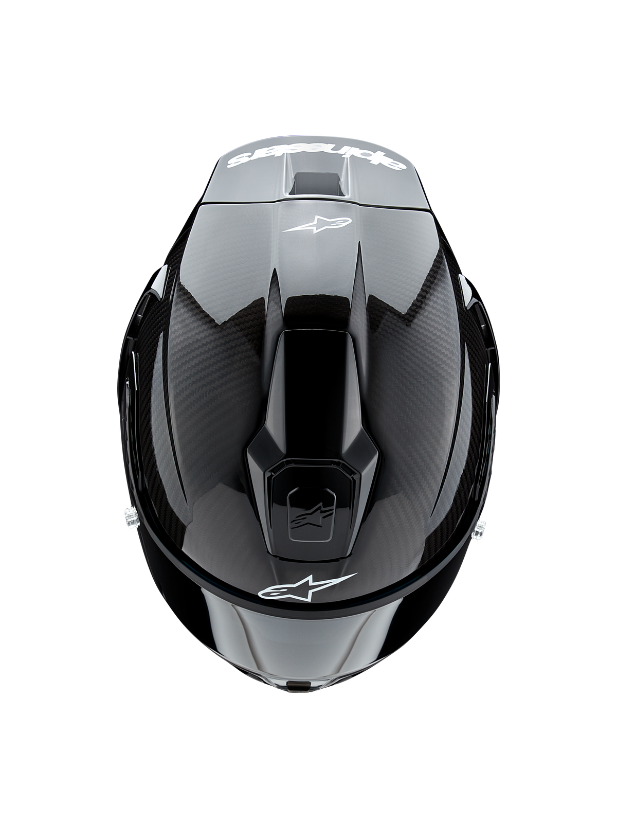 Casco Alpinestars Supertech R10 Solid, vista superior, negro carbono mate y brillante, mostrando la textura de fibra de carbono en los laterales, sección central brillante, ventilaciones aerodinámicas y logotipo de Alpinestars blanco en la parte frontal y trasera
