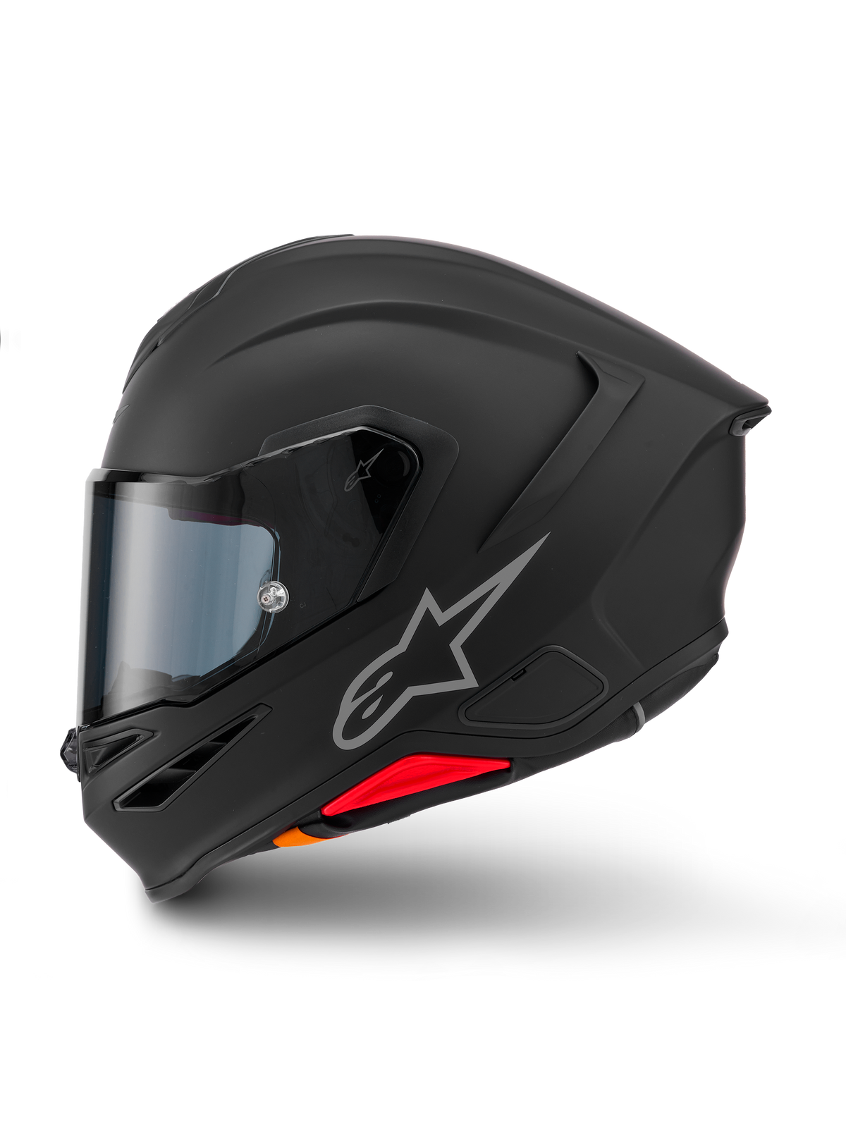 Casco Alpinestars S-R7 Solid, casco integral de moto, negro mate, vista de perfil lateral con el logotipo plateado de Astars en el lateral, diseño aerodinámico con alerón integrado y detalles en rojo y naranja en la base.