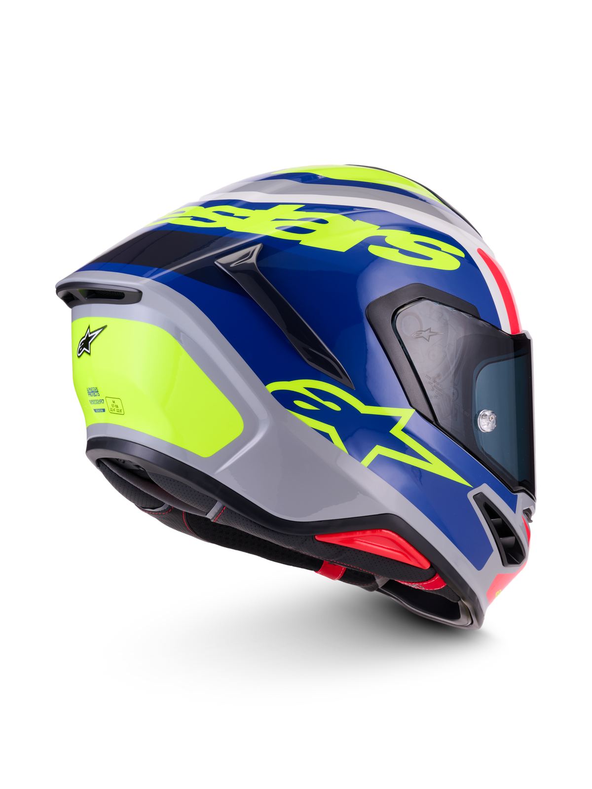 Alpinestars S-R7 Lumen, casco integral de moto para carreras, acabado brillante en plata, azul, rosa y amarillo, vista lateral trasera