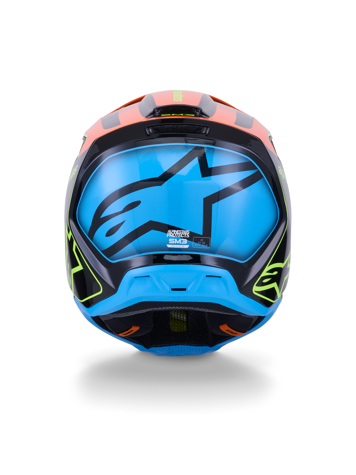 Casco Alpinestars S-M3 Fray ECE 22.06, casco de motocross, vista trasera, negro con detalles vibrantes en naranja y amarillo neón, panel azul grande con el logotipo de la estrella de Alpinestars en negro, protección para carreras todoterreno