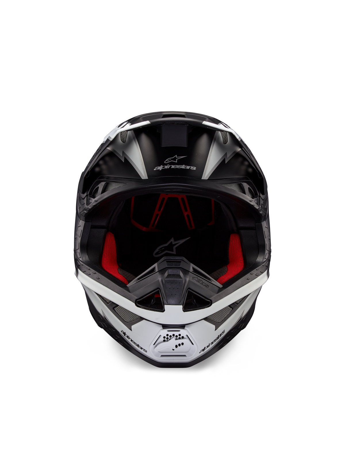Casco Alpinestars Supertech M10 Ampress, casco de motocross, negro y blanco mate, vista frontal con forro interior rojo, carcasa aerodinámica con puertos de ventilación y logotipo de Alpinestars