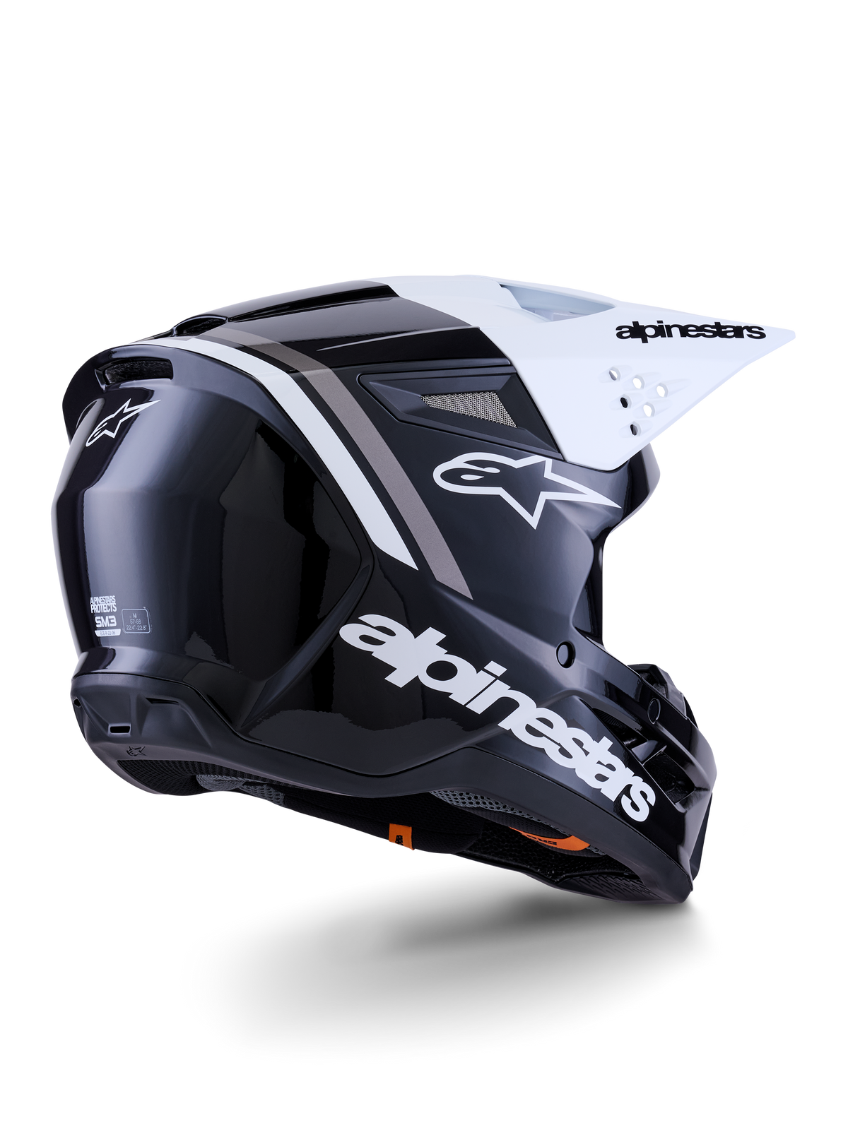 Alpinestars S-M3 Radium Helmet, Motocross Helmet, Black White and Gray Glossy, rear-side view with white visor, featuring bold Alpinestars logo on the side and back, sleek aerodynamic shell with ventilation mesh, designed for off-road motocross and enduro