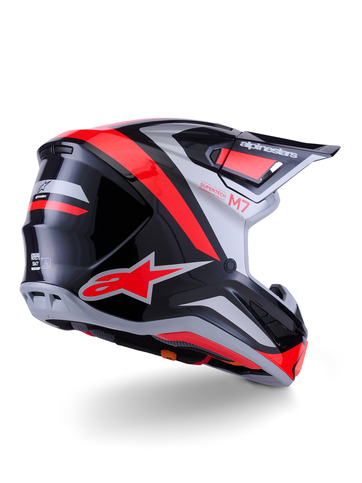 Alpinestars S-M7 Rise Helmet, Motocross Helmet, Black Silver and Red Fluo Glossy, three-quarter rear view, featuring bold red A-star logo and silver accents, aerodynamic shell with visor, professional off-road racing protection