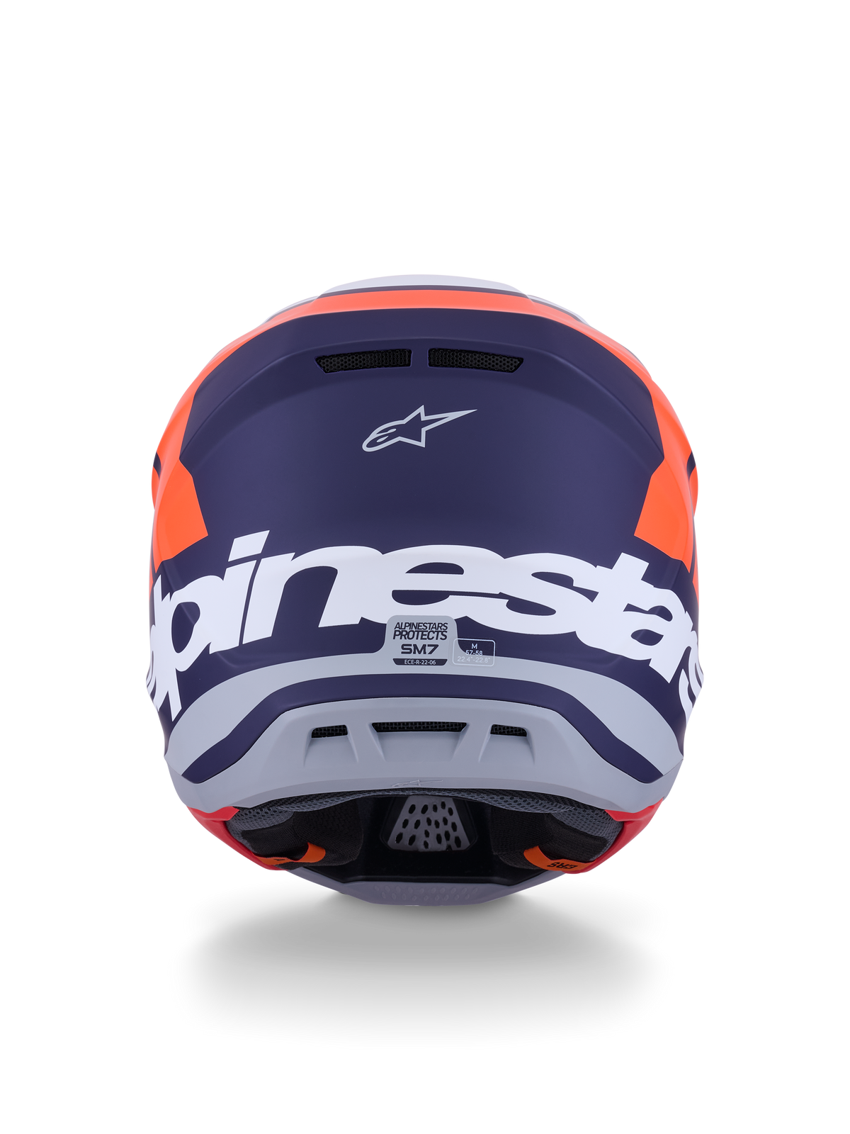 Alpinestars S-M7 Core Helmet ECE 22.06, casco de motocross, naranja y azul mate, vista trasera con gran marca Alpinestars en blanco y logotipo de Astars, diseño aerodinámico estilizado con puertos de escape integrados, protección todoterreno de nivel profesional