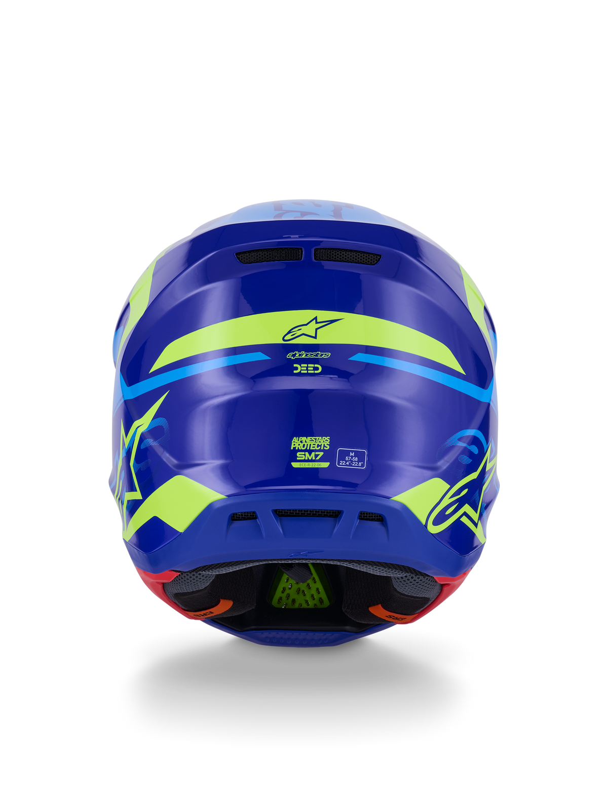Casco Alpinestars S-M7 Deed ECE 22.06, casco de motocross, vista trasera, azul y amarillo flúor brillante, con gráficos llamativos en amarillo flúor y logotipos de estrellas, puertos de escape traseros y acolchado interno visible con tecnología PLASMA verde.