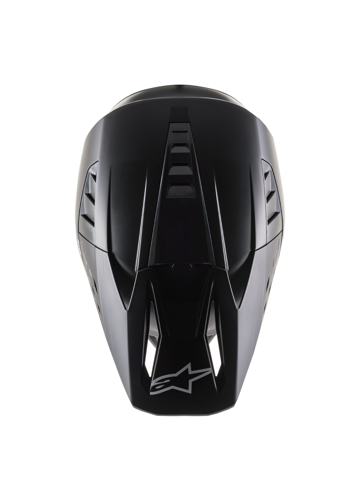 Alpinestars S-M5 Solid Helmet ECE 22.06, casco de motocross, negro mate, vista superior que muestra la calota aerodinámica con crestas de ventilación, visera con puertos de entrada de aire y logo de Alpinestars, elegante acabado mate diseñado para carreras todoterreno.
