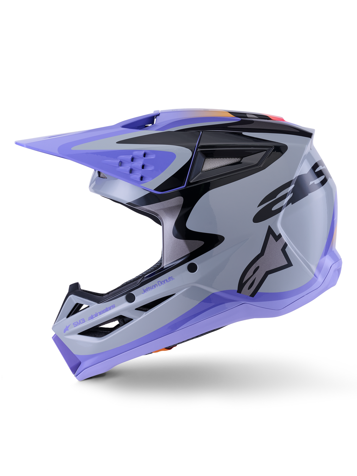 Casco Alpinestars S-M3 Jettson Juvenil, casco de motocross, gris, púrpura y negro brillante, con visera y borde inferior púrpuras, patrones gráficos negros con logotipo lateral, protección profesional para la cabeza en carreras todoterreno juveniles