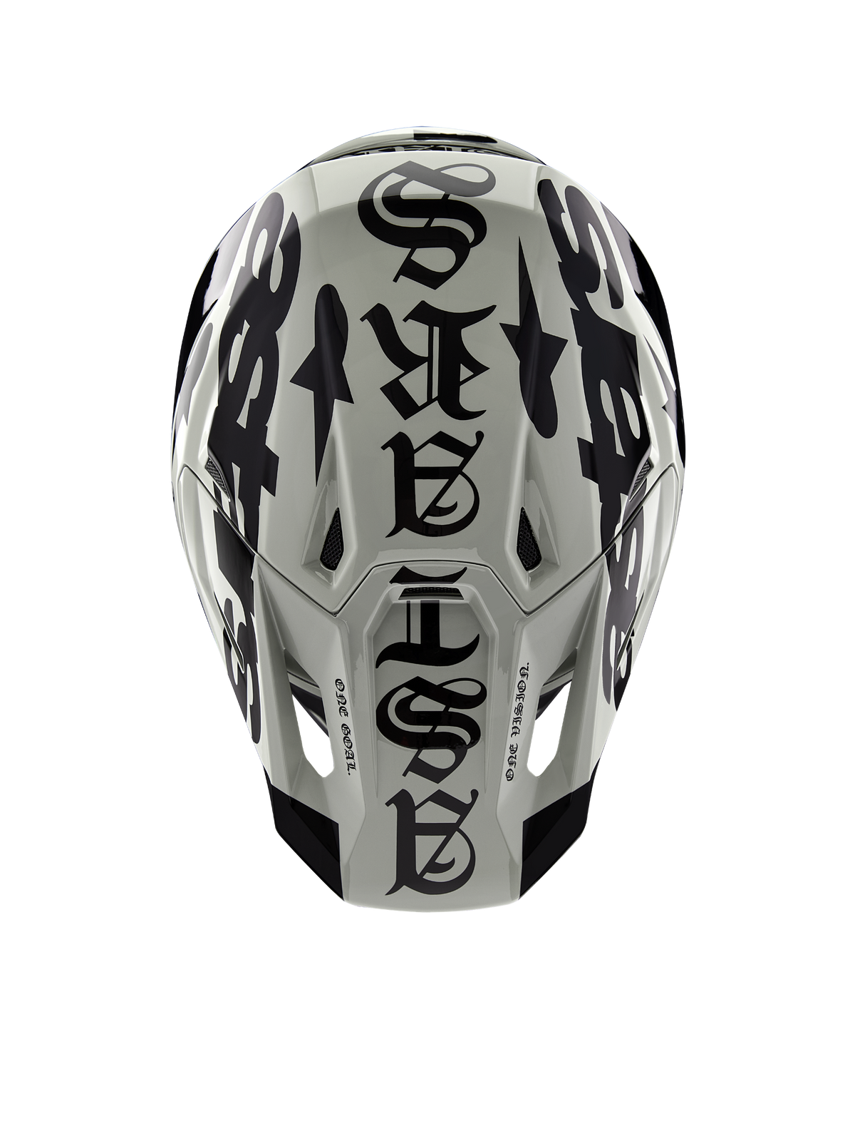 Alpinestars Limited Edition S-M7 Wolf Dust Helmet, top view, Dune and Black glossy finish, featuring bold gothic-style typography across the crown and One Goal One Vision detailing, professional motocross racing head protection