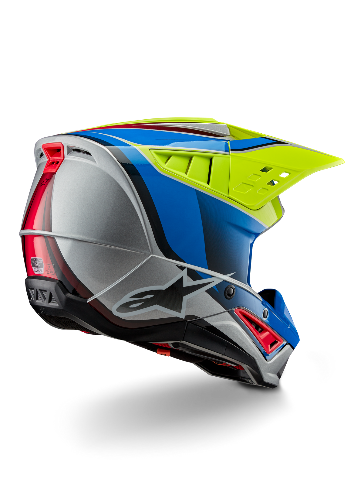 Alpinestars S-M5 Sail Helmet ECE, casco de motocross, amarillo flúor, azul esmalte y plata brillante, vista trasera de tres cuartos que muestra la calota termoplástica aerodinámica, visera grande ventilada y conductos de refrigeración integrados para protección en carreras todoterreno