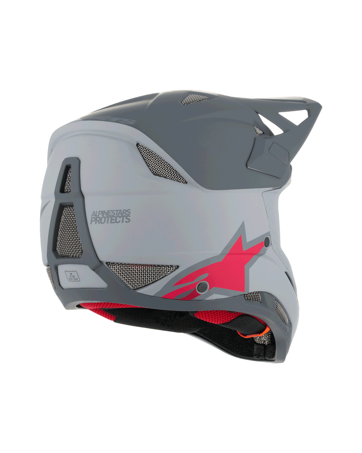 Casco Alpinestars Missile Tech Racer, casco integral de MTB, gris claro y gris oscuro mate con logo de estrella roja, vista lateral trasera que muestra la malla de ventilación y el perfil aerodinámico, protección para ciclismo de descenso