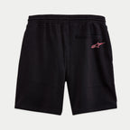 Alpinestars Dunker Short, short de entrenamiento de forro polar en color negro, vista posterior con cintura elástica, bolsillo trasero de ribete y logotipo Ageless rojo y blanco en la cadera.