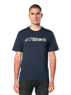 Alpinestars Blaze 2.0 CSF Tee, Navy Blue Short Sleeve T-Shirt with White Astars Logo Graphic, worn by a man with dark jeans, Casual Motorsport Lifestyle Apparel
