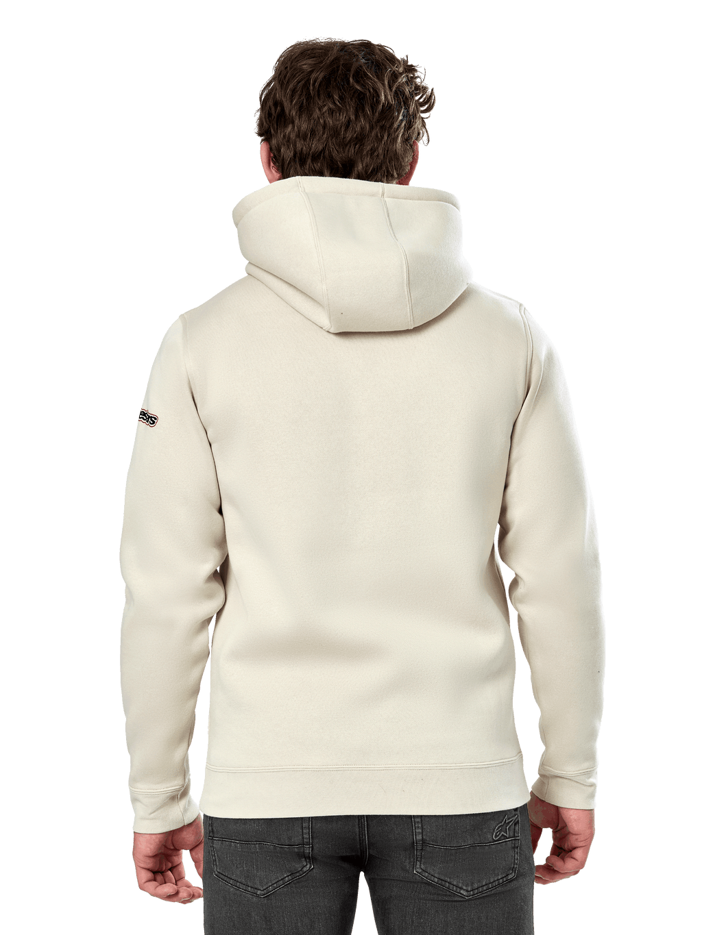 Sudadera Alpinestars Insignia Hoodie, vista trasera de un hombre con una sudadera de forro polar informal, color Off White, con capucha forrada y puños de canalé, ropa urbana inspirada en el automovilismo