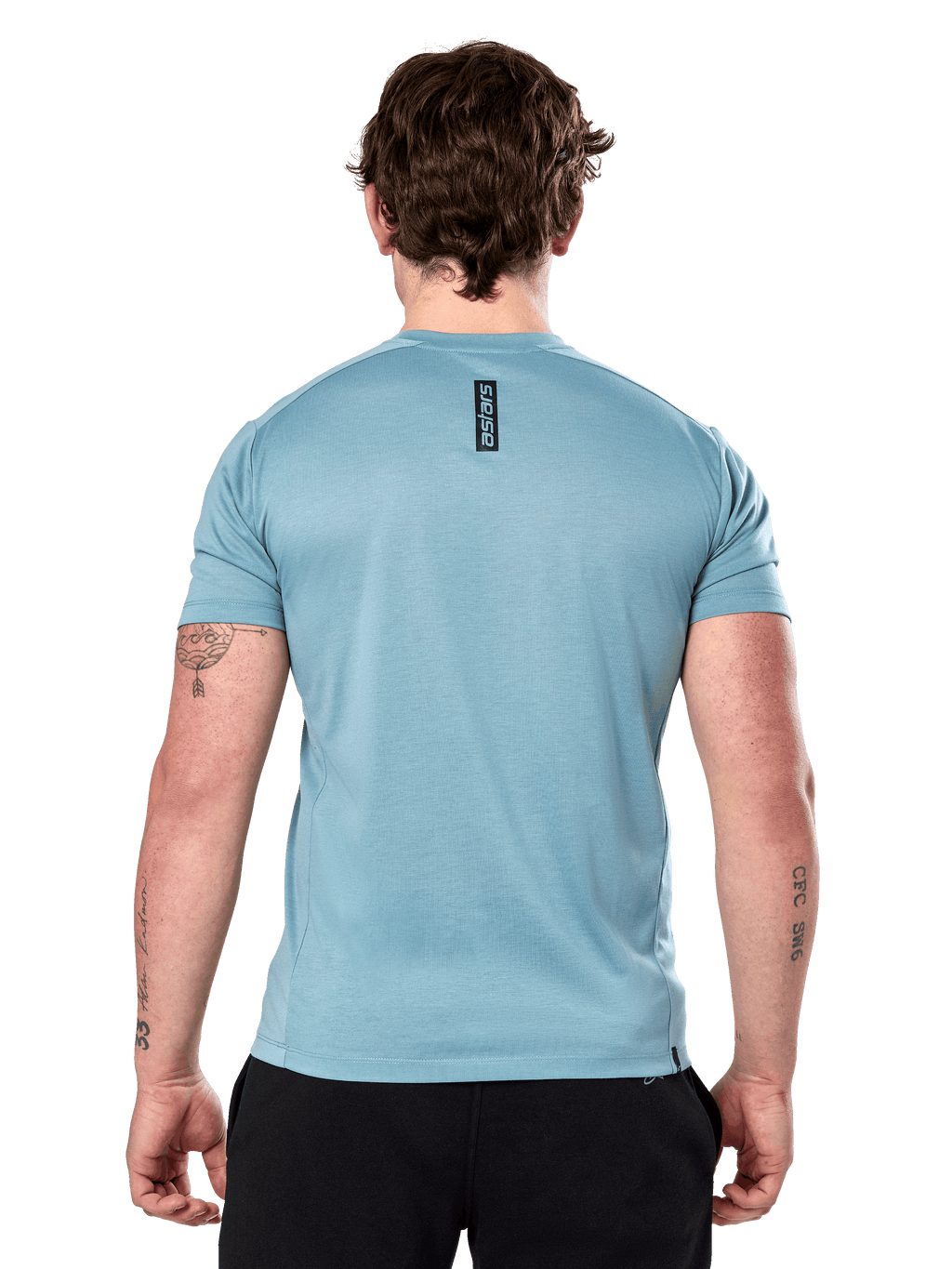 Alpinestars Point Performance Tee de manga corta, azul hielo, vista trasera con logotipo vertical negro 'astars' en la parte superior de la espalda, tejido técnico con absorción de humedad, ropa deportiva casual