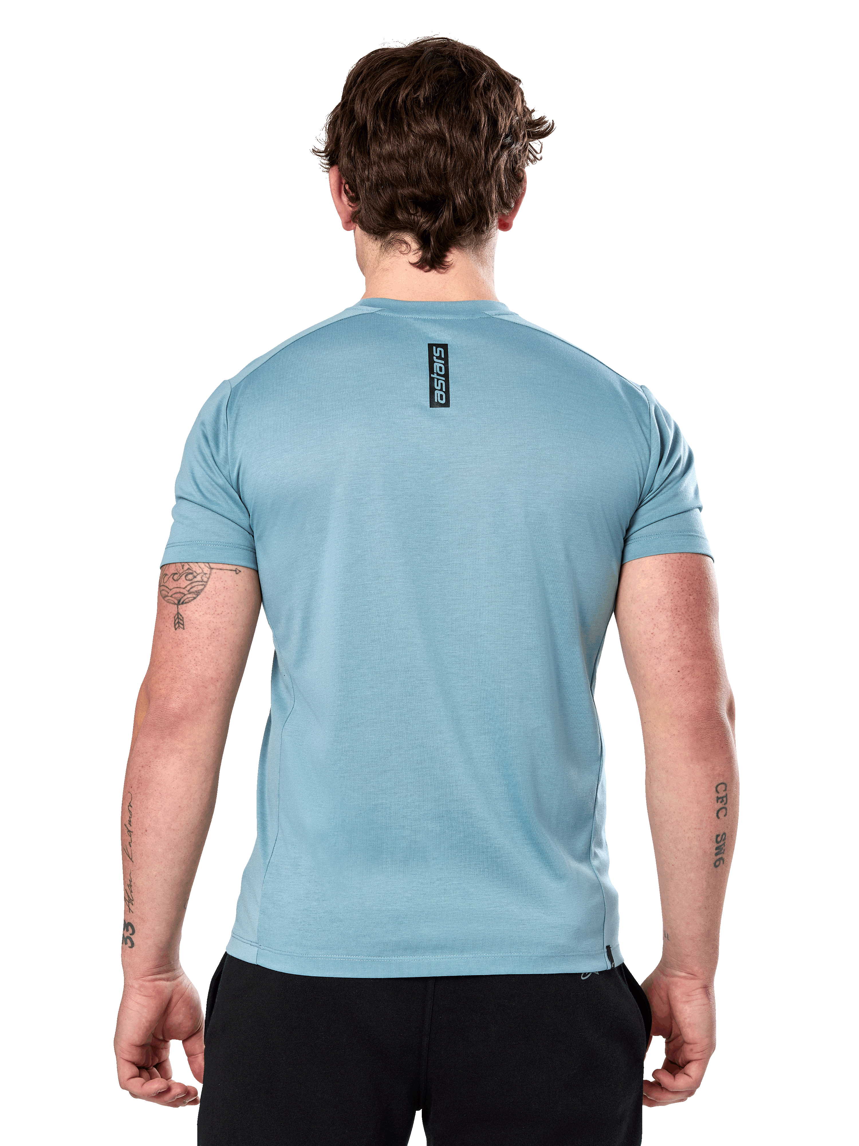 Alpinestars Point Performance Tee de manga corta, azul hielo, vista trasera con logotipo vertical negro 'astars' en la parte superior de la espalda, tejido técnico con absorción de humedad, ropa deportiva casual