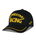 Gorra Alpinestars Luminary, gorra de béisbol negra, bordado 3D amarillo "ALPINESTARS RACING", visera curva con ribete amarillo, logo de estrella lateral, ropa urbana casual de estilo automovilismo