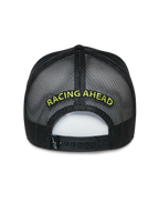 Alpinestars Exceed Trucker Hat, Black Trucker Cap, Back view showing mesh panels and snap-back closure, Lime Green 'RACING AHEAD' embroidery, casual motorsport-inspired headwear