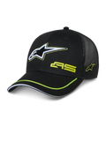 Alpinestars Exceed Trucker Hat, black trucker cap with structured front and mesh back, featuring a large white and lime green embroidered Astars logo, AS branding on crown, curved bill with lime green trim, casual motorsport headwear