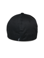 Alpinestars Gorra Cereal, gorra de béisbol negra, vista trasera con construcción flexible y un pequeño logotipo blanco bordado en la base, accesorio de estilo deportivo casual